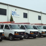 Service Vans in a Row Outside of Geauga Mechanical Building